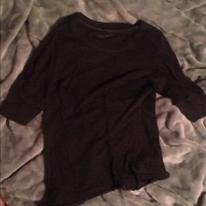 Grey/black quarter sleeve high waisted shirt.